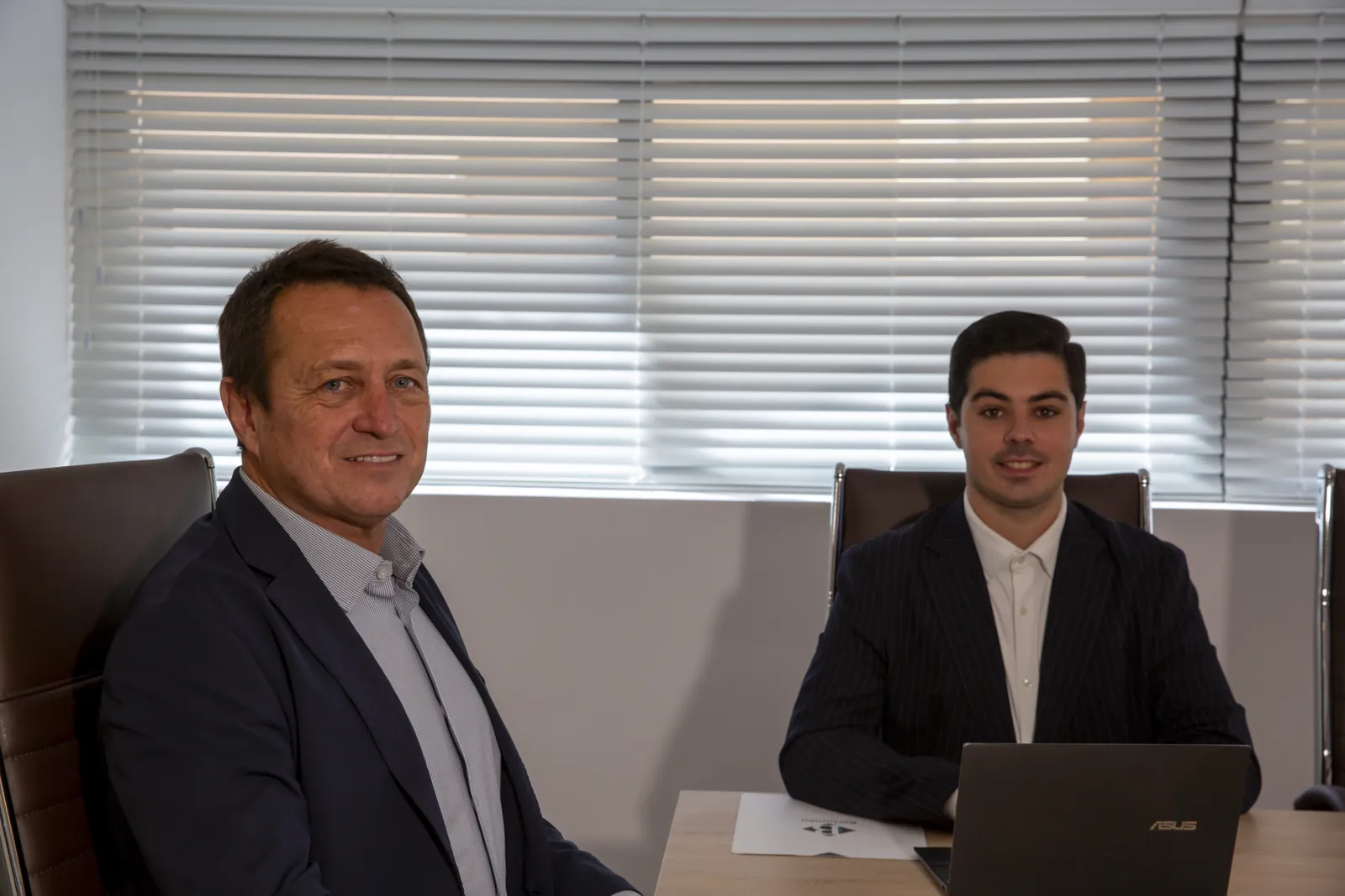 Juan Antonio Bertomeu and Daniel Bertomeu at the office